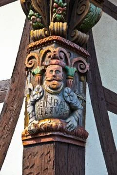 Carvings in the frame work of an old medieval house Stock Photos