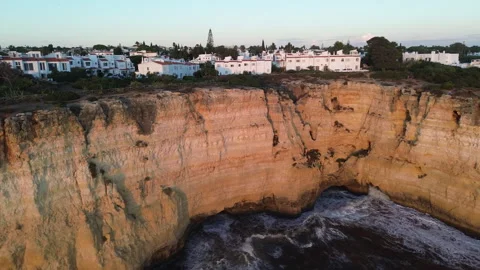 Carvoeiro cliffs sunset aerial Video stock 321425601