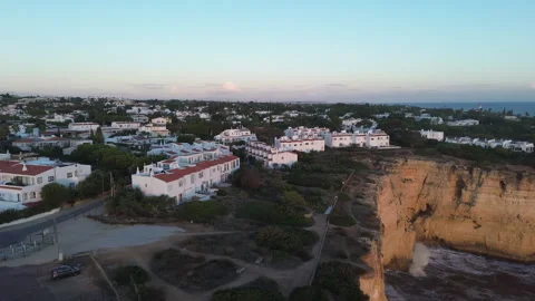 Carvoeiro cliffs sunset aerial Video stock 321425690