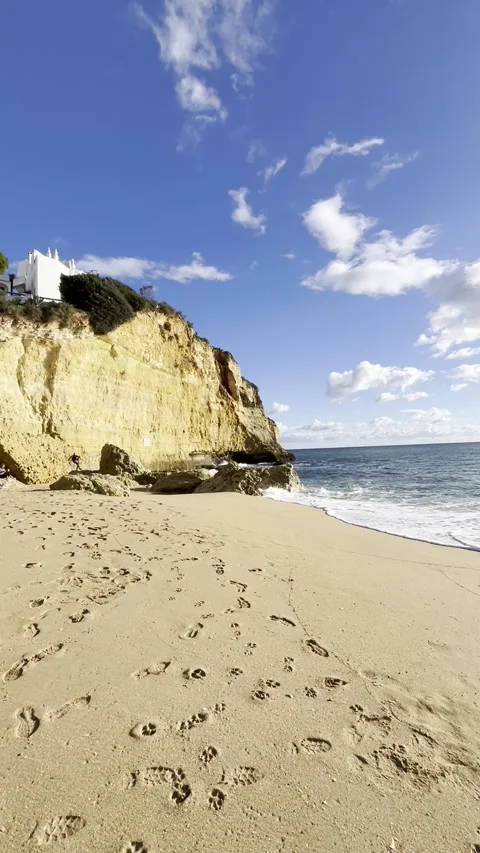 Carvoeiro golden cliff splashed Stock Footage 332178125