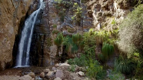 Cascade on desert during sunny day STEADY SHOT Stock Footage 88472302