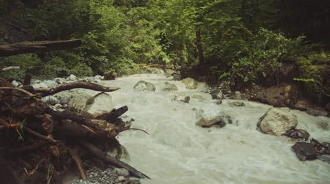 Cascade falls over old plum river with rocks. Video stock 63224794