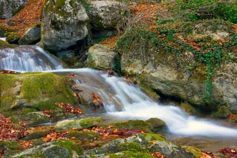 Cascade of mountain river Stock Photos