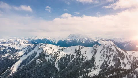Cascade Mountains Aerial Hyperlapse with Clouds Rolling Over Snowy Mt Shuksan Stock Footage