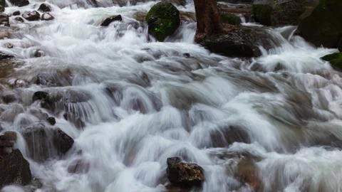 Cascade in the mountains Stock Photos