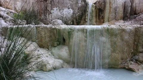 Cascade in outdoor thermal baths. The White whale waterfall. Left Right Pan view Stock Footage 84707774