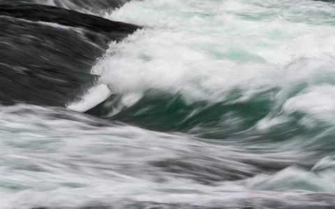 Cascade on rapid mountain river close up Stock Photos