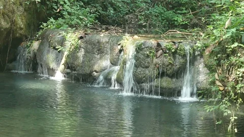Cascade of the tropical limestone stream Stock Footage 97940066