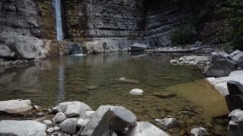 Cascade valley and a beautiful waterfall in mountains. Great scenic view Stock Footage 162499862
