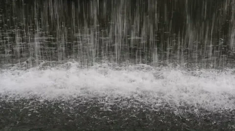Cascade of water on  surface of the pond Stock Footage 29365063