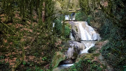 Cascade waterfall in  autumn forest Stockbeeldmateriaal 85237969