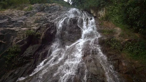 Cascade waterfall in picturesque jungle rainforest Stock Footage 111440645