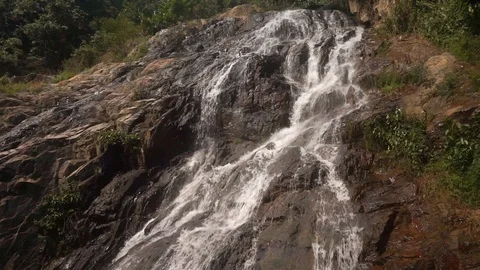 Cascade waterfall in picturesque jungle rainforest Stock Footage 111440693