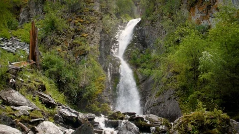 Cascade waterfall slow motion. Streams of water among the mountains, huge Stock Footage 95525098