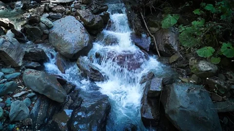 Cascade of waterfalls at Rosa Khutor Stock Footage 96383418