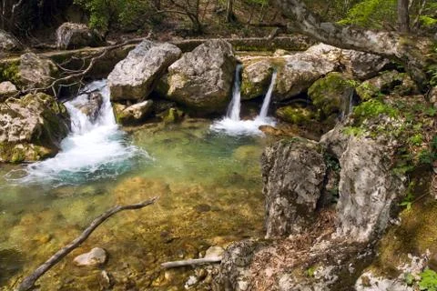Cascades on mountain river Stock Photos