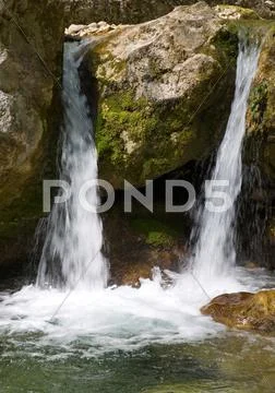 Cascades on mountain river Stock Photos