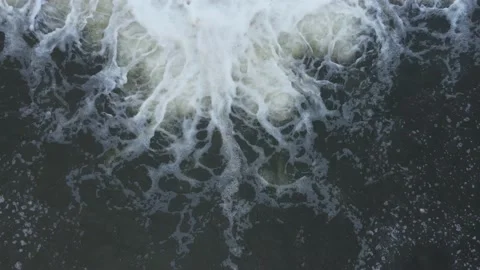 Cascading bubbling river weir water flowing drone footage Stock Footage 166804699