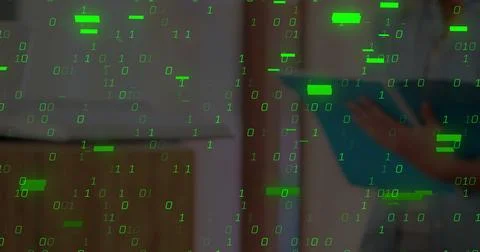 Cascading green binary digits overlaying blurred office shelving, with person Foto stock