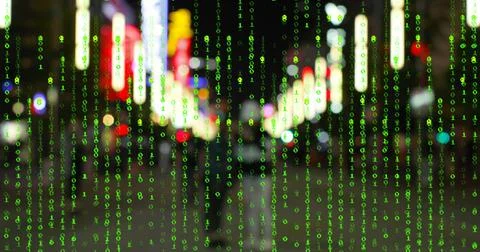 Cascading green binary digits overlaying wet city street, with neon signs and Foto stock