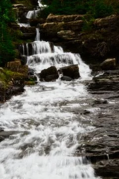 Cascading Mountain Waterfall in Spring 스톡 사진