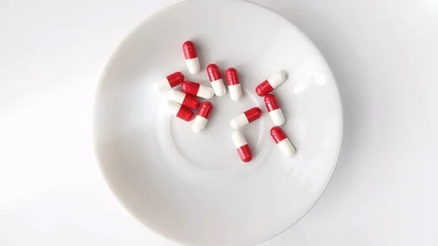 Cascading pills Stock Footage 105870943