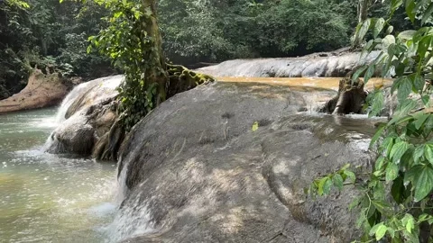 Cascading River Water Flowing Over Rocks in Tropical Rainforest, Static Shot Stock Footage 324272466