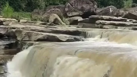 Cascading River Waterfall Over Rock Layers Stock Footage 337946583