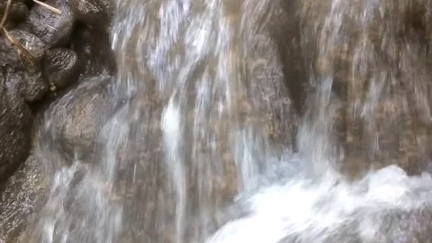 Cascading Stream over Rocky Terrain Stock-Footage 334761098