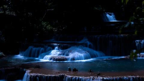 Cascading Tiered Waterfall Flowing Through Deep Forest At Huai Mae Khamin W.. Fotos Stock