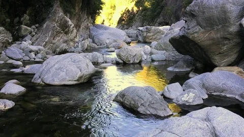 Cascading Water Slides Down Rocks and Stones Video stock 72957694