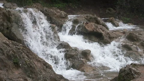 Cascading waterfall after heavy rain in the mountains of Galilee Stock Footage 170726613