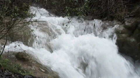 Cascading waterfall after heavy rain in the mountains of Galilee Stock Footage 170726622