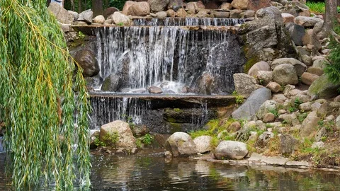 Cascading Waterfall In City Park Stock Footage 115568183