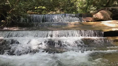 Cascading waterfall deep inside South Carolina mountains Stock Footage 129640859