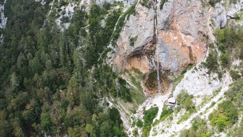 Cascading Waterfall Floating Down a Rocky Mountain Facade, Rinka Waterfalls Stock Footage 168139960
