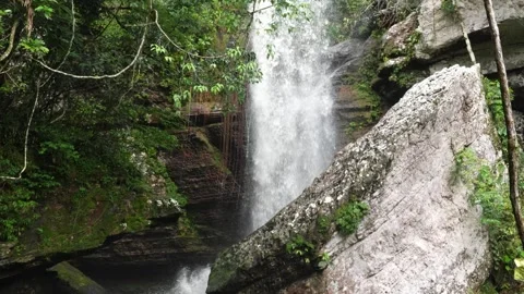 Cascading Waterfall Flowing Over Mossy Rocks in Guaviare Stock-Footage 336521040