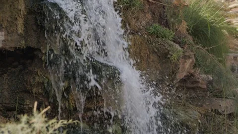 Cascading waterfall into pond. Day. Stock Footage 268722001