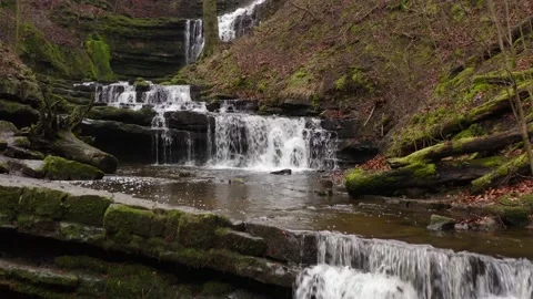 Cascading waterfalls surrounding Scaleber Force in The Yorkshire Dales, UK. Stock Footage 233520961