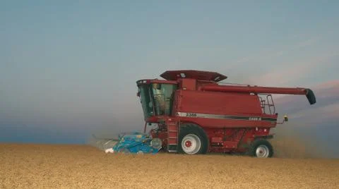 Case combine with stripper header Stock-Fotos