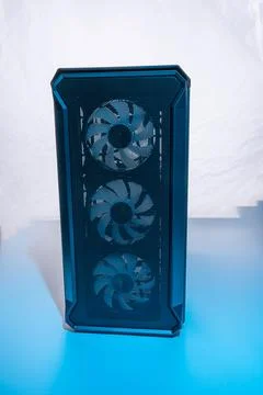 Case of the computer system unit with neon illumination. vertical photo Stock Photos