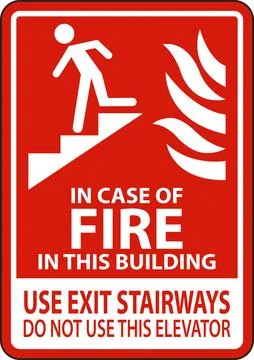 In Case of Fire In This Building Use Exit Stairways Do Not Use This Elevator Ilustración de archivo
