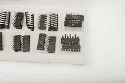 A case for microchips. A plastic container with electronic chips. Microchip.. Stock Photos