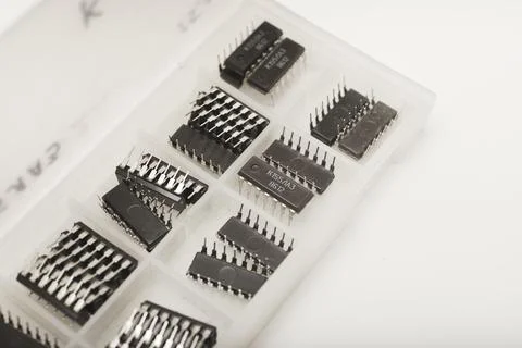 A case for microchips. A plastic container with electronic chips. Microchip.. Stock Photos