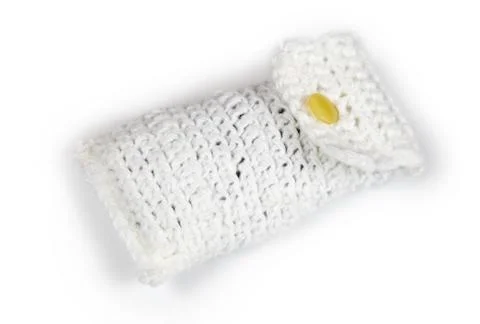 Case for mobile phone made of wool yarn Stock Photos