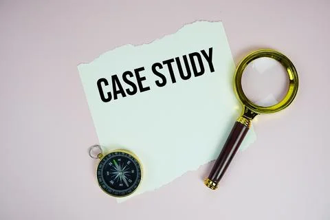 Case Studies text written on paper torn with compass and magnifying glass t.. Stock Photos