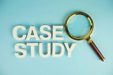 Case Study alphabet letters with magnifying glass on blue background Stock Photos