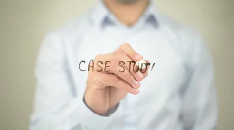 Case Study   ,  man writing on transparent wall Video stock 62634356
