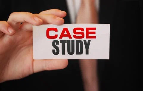 Case study, message on white card in hand of businessman Stock Photos