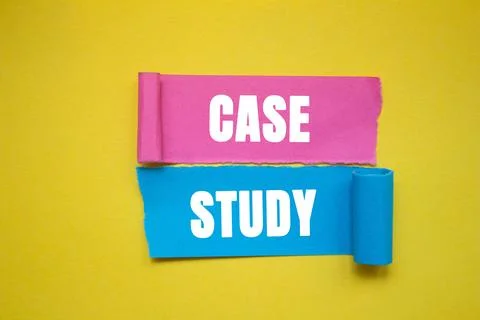 Case study message written on ripped torn color paper pieces on yellow back.. Stock Photos